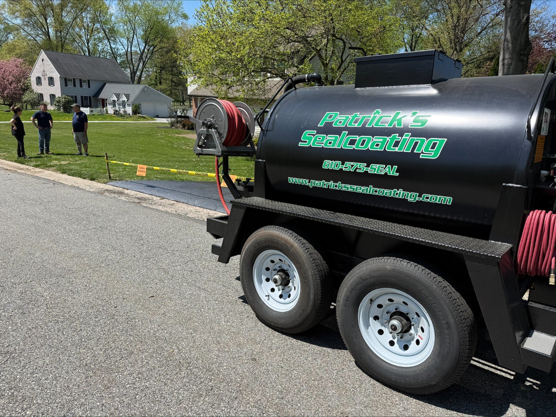 Patrick's Sealcoating tank trailer on-site